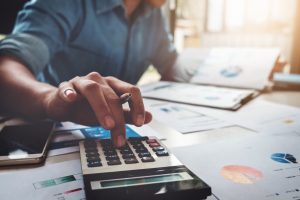 Person calculating Self-Managed Super Fund